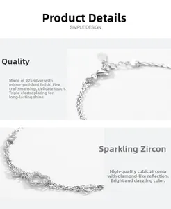 Detail of s925 silver double-chain bracelet featuring a hollow and pavé zircon heart
