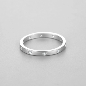 Minimalist S925 sterling silver geometric band ring featuring evenly spaced clear gemstones