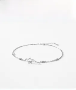 Detailed view of double-layer S925 silver star anklet with sparkling zircon accents