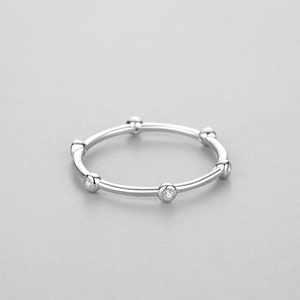 Minimalist S925 sterling silver stacking ring featuring delicate pave cubic zirconia stones