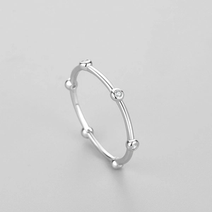 S925 sterling silver minimalist ring with tiny round zircon stones in a bead setting