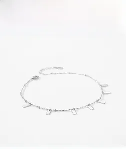 Detail of s925 silver ball chain bracelet featuring polished rectangular pendants