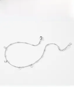 Detail of 925 sterling silver chain with hollow heart pendants and lobster clasp