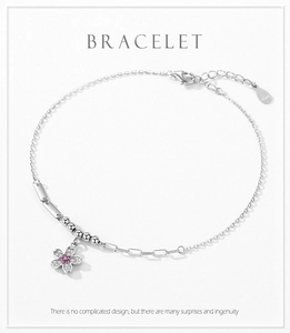Close-up of S925 silver flower bracelet featuring pink zircon stones and lobster clasp