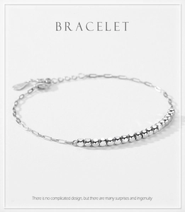 Macro view of S925 sterling silver beaded bracelet with adjustable lobster clasp