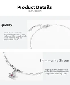 Detailed macro view of S925 sterling silver bracelet with pink zircon flower charms