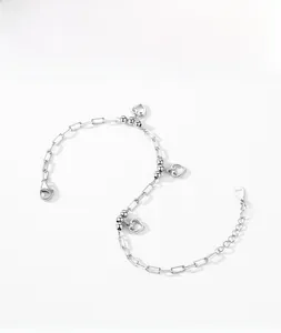 Detailed macro view of S925 sterling silver heart bracelet with geometric rectangular links