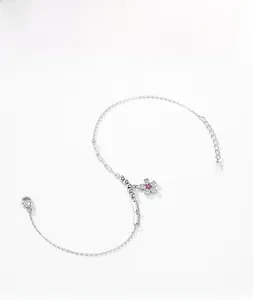 Macro detail of S925 sterling silver flower bracelet with pink zircon stone inlay