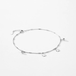 Elegant S925 sterling silver beaded bracelet with clover pendant on white background