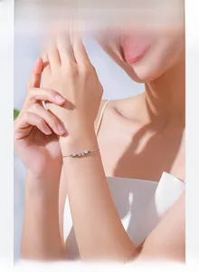 Detailed close-up of S925 sterling silver geometric bracelet on a female wrist