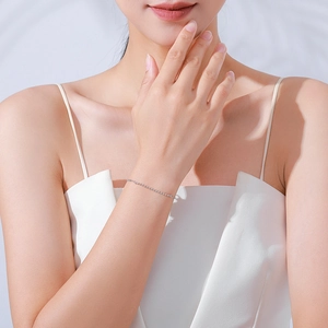 Elegant 925 sterling silver bead bracelet on model's wrist with minimalist style