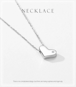 Detail of s925 silver heart necklace with micro-set zircon and fine O-chain link