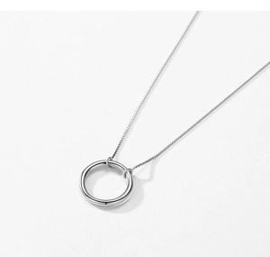 Macro view of polished s925 silver round pendant with minimalist box chain necklace