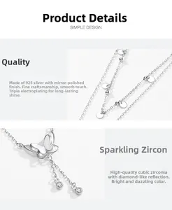 Détail macro du pendentif papillon en argent massif S925 avec pierres de zircone cubique