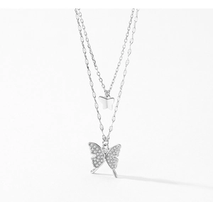 Close-up of S925 sterling silver double-layered butterfly necklace with pavé zircons