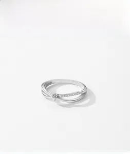 Macro shot of S925 sterling silver crisscross ring with micro-pave cubic zirconia