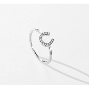 Detailed view of S925 silver U-shape ring featuring micro-pave cubic zirconia stones