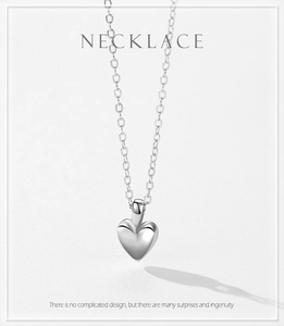 Detailed view of S925 sterling silver minimalist heart pendant with a polished finish