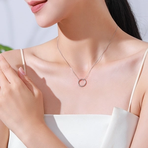 Minimalist S925 sterling silver hollow circle pendant necklace worn on neck