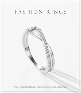 Detailed view of S925 silver geometric ring with micro-pave twisted rope design