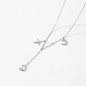 S925 sterling silver necklace with star and moon charms on a minimalist chain