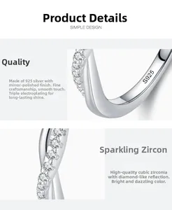 Detailed close-up of S925 sterling silver stamp and sparkling cubic zirconia on cross ring