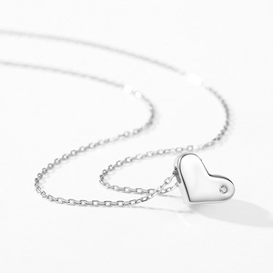 Minimalist S925 sterling silver heart pendant necklace with shimmering zircon accent