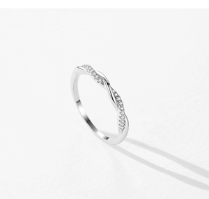 Detail of S925 sterling silver ring with pavé-set micro zircons and twisted rope design
