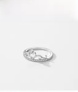 Macro shot of S925 sterling silver crown ring showing hallmark and zircon pavé detail