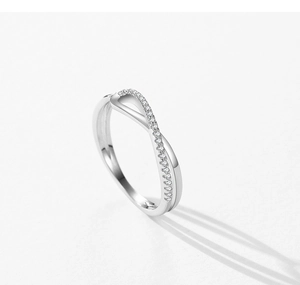 Detail of S925 silver geometric ring with twisted band and micro-set pavé zircon stones