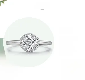 Detail of S925 sterling silver ring featuring a micro-pave round diamond and T-cut stones
