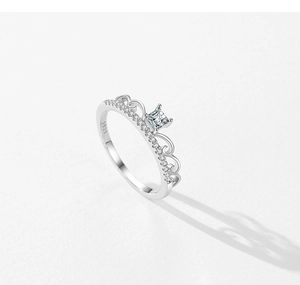 Macro view of S925 sterling silver crown ring featuring square cut cubic zirconia stone