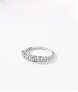Close-up of S925 sterling silver ring featuring seven graduated round brilliant zircons