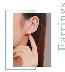Close-up of S925 silver flower stud earrings with marquise-cut marquise-cut cubic zirconia