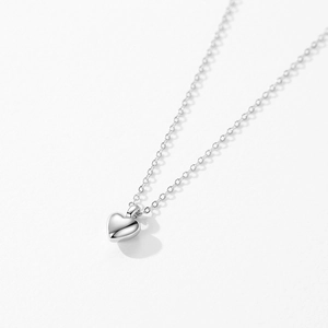 Minimalist S925 sterling silver heart pendant necklace with polished cross chain for women