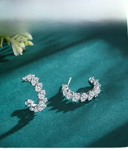 Close-up of S925 silver C-shape earrings with marquise-cut marquise-cut zircon stones