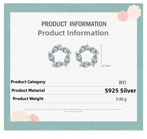 Detail of S925 sterling silver flower stud earrings with zircon stones, 0.7cm size