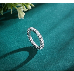 Detailed view of S925 sterling silver eternity ring with sparkling micro-pave stones