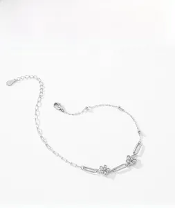 Macro shot of S925 sterling silver flower bracelet featuring micro-pave cubic zirconia detail