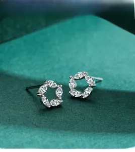 Macro shot of S925 sterling silver flower earrings with marquise-cut marquise crystals
