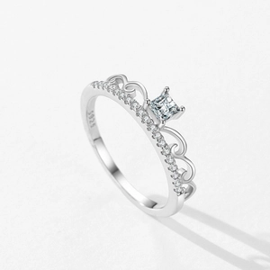 S925 sterling silver crown ring with square central zircon on a white background