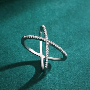 Crossed X-shape S925 sterling silver ring with sparkling cubic zirconia pavé stones