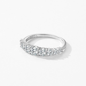 Elegant S925 sterling silver band ring featuring seven round bright-cut sparkling stones
