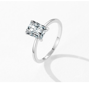 Macro detail of S925 sterling silver ring showing the 4-prong set radiant cut gemstone