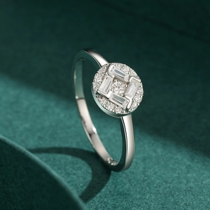 S925 sterling silver ring with square micro-pave center stone on dark green surface