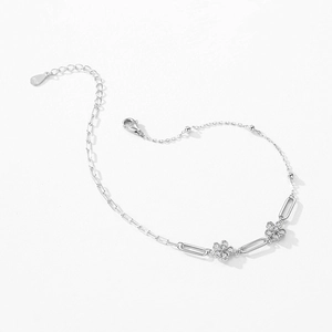 Elegant S925 sterling silver flower bracelet with pave crystals on white background