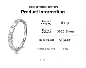 Vue détaillée d'une bague en argent S925 avec motifs géométriques et pierres serties