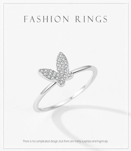 Close-up of S925 silver butterfly ring featuring intricate pavé diamond setting detail