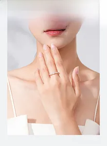 Close-up of S925 sterling silver square zircon ring worn by a model in soft lighting