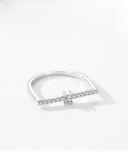 Detail of square zircon and S925 sterling silver U-shaped ring with pave setting